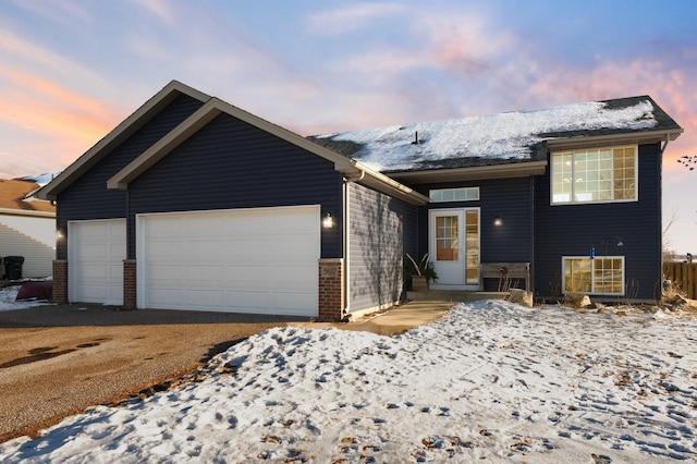 view of front of property featuring a garage