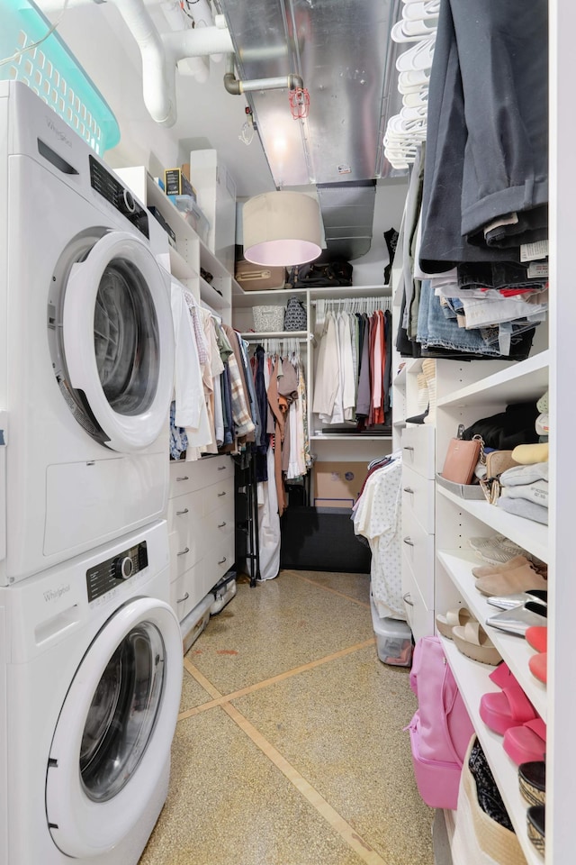 laundry room with stacked washer and dryer