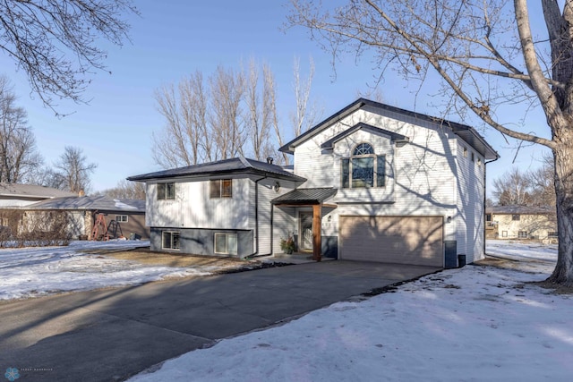 view of front of property with a garage