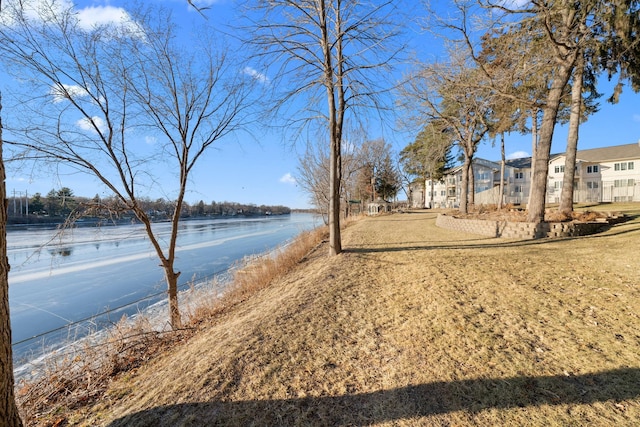 view of yard with a water view