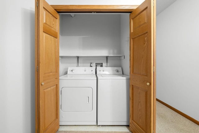 laundry room featuring separate washer and dryer