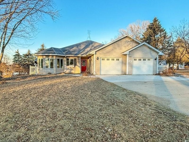 single story home with a garage