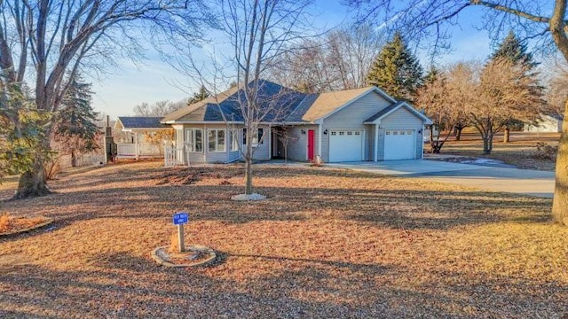 single story home with a garage