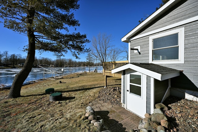 view of yard with a water view