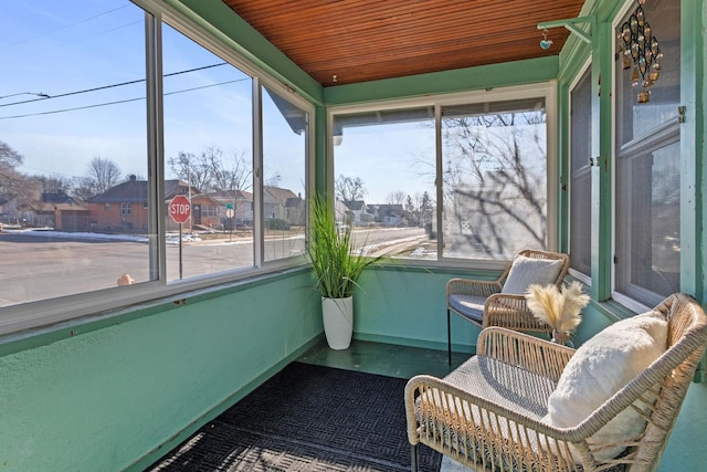 sunroom with wood ceiling