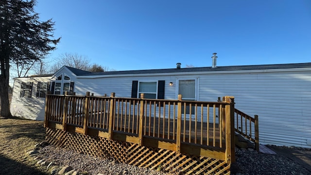 rear view of house with a deck