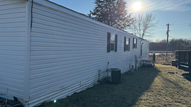 view of home's exterior with cooling unit