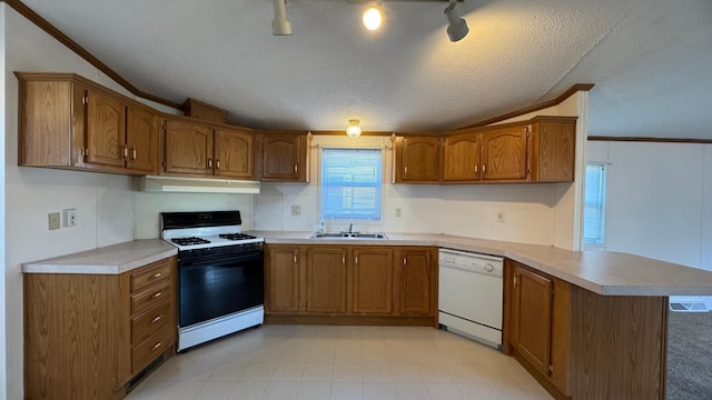 kitchen featuring kitchen peninsula, a textured ceiling, white appliances, crown molding, and sink