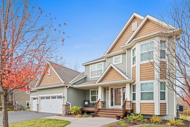 craftsman house with a garage