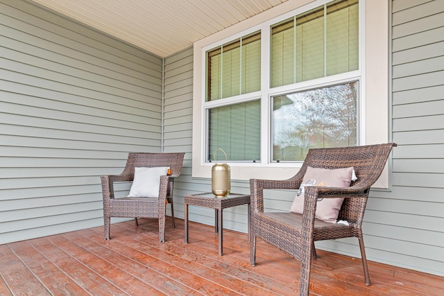 wooden deck featuring covered porch