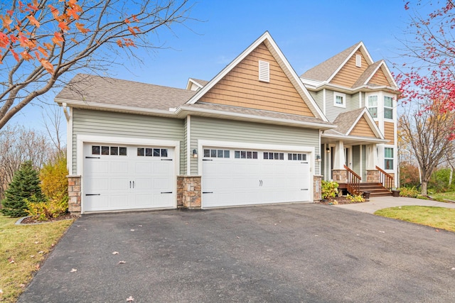 craftsman-style house featuring a garage