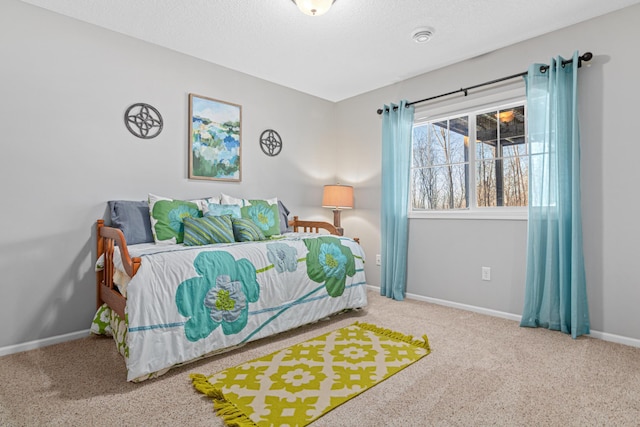 bedroom featuring carpet