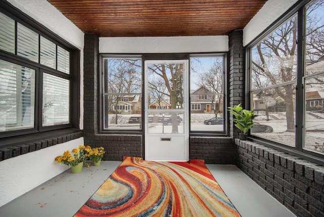 sunroom / solarium with wood ceiling