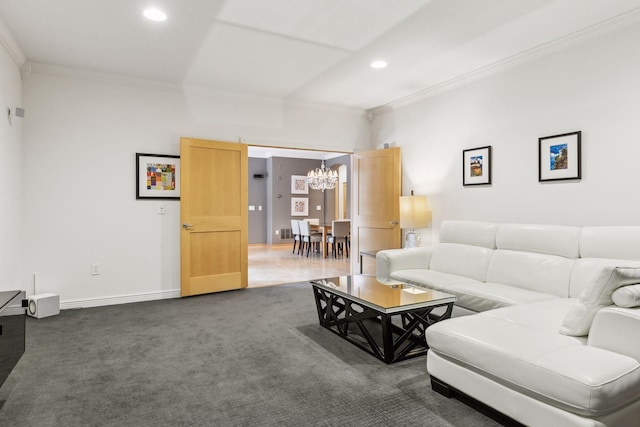 carpeted living room featuring crown molding and an inviting chandelier