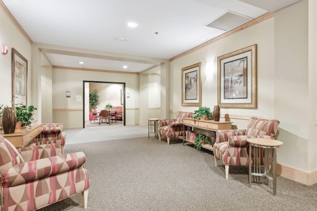 living area with ornamental molding and carpet flooring