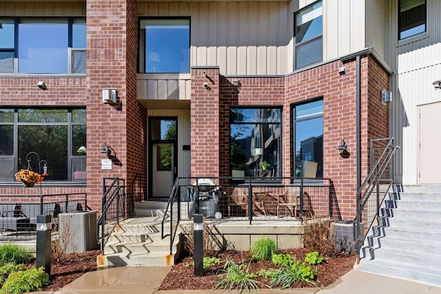 187 Sherman St, Saint Paul, MN 55102 - view of front of property with brick siding and cooling unit
