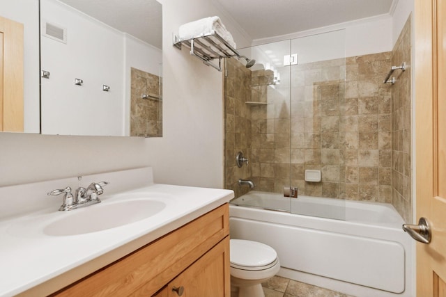 187 Sherman St, Saint Paul, MN 55102 - full bath featuring toilet, vanity, combined bath / shower with glass door, ornamental molding, and tile patterned flooring