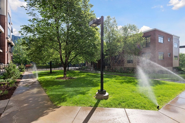 187 Sherman St, Saint Paul, MN 55102 - view of property's community with a lawn