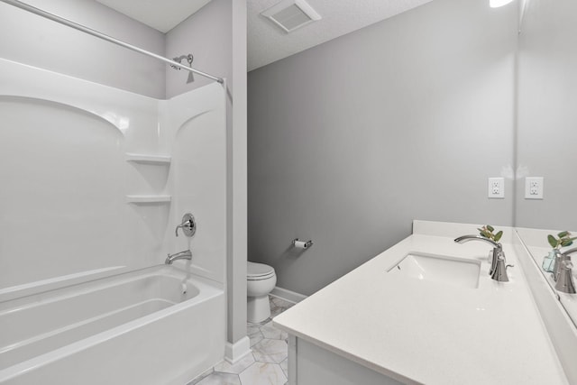 full bathroom featuring bathing tub / shower combination, vanity, a textured ceiling, and toilet