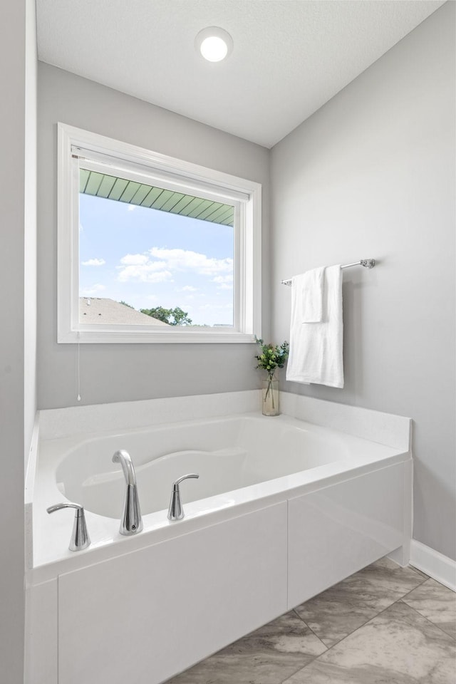 bathroom with a bathing tub