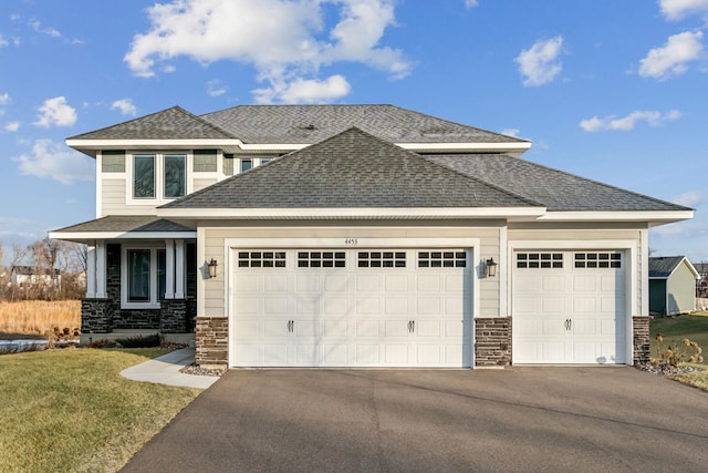 prairie-style home with a garage