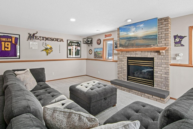 living room with a fireplace, a textured ceiling, and carpet flooring