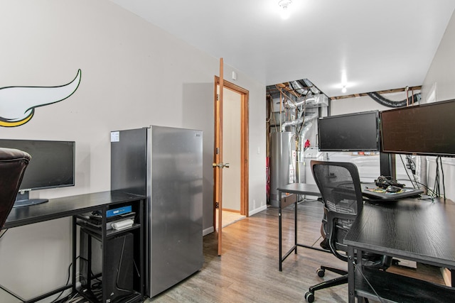 office space with light hardwood / wood-style floors