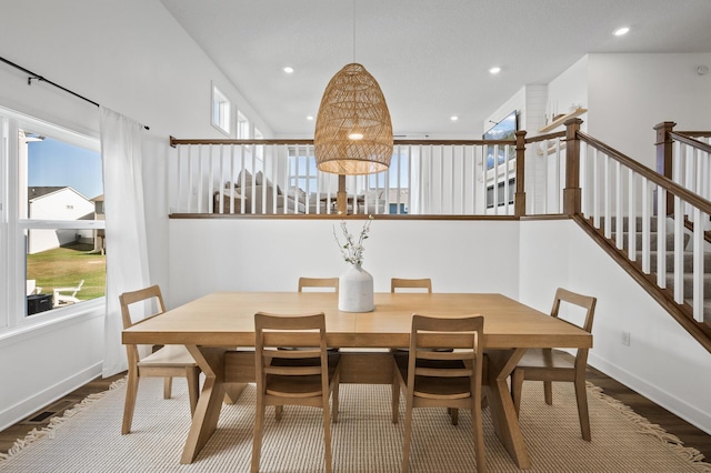 dining area featuring wood-type flooring