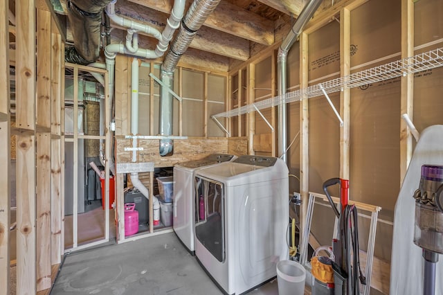 laundry area with washing machine and clothes dryer