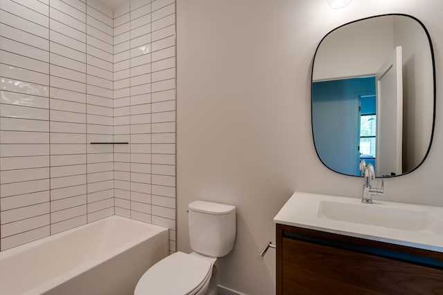 full bathroom featuring vanity, toilet, and tiled shower / bath combo