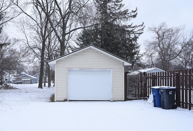 view of snow covered garage