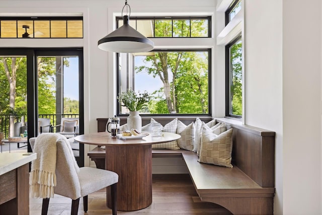 sunroom with breakfast area and plenty of natural light