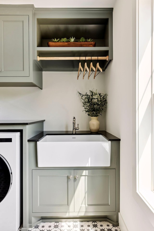 interior space featuring washer / clothes dryer and sink