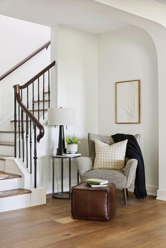 living area with hardwood / wood-style floors