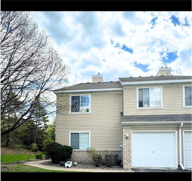 exterior space featuring a garage