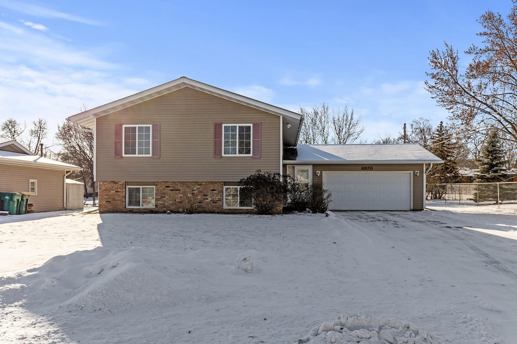 tri-level home featuring a garage