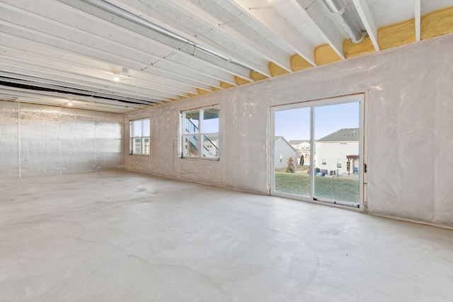 empty room featuring concrete flooring and a healthy amount of sunlight