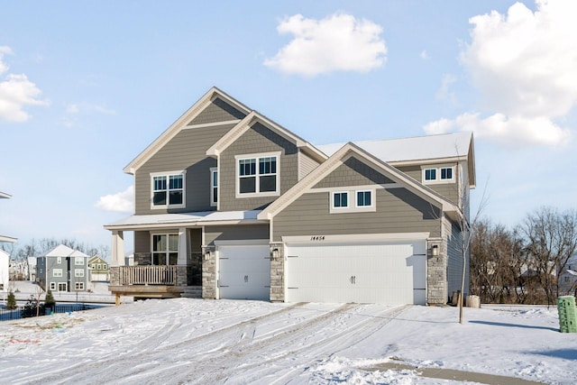 craftsman-style home with a garage and a porch