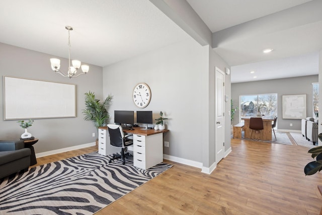 home office featuring baseboards, recessed lighting, light wood-type flooring, and a notable chandelier