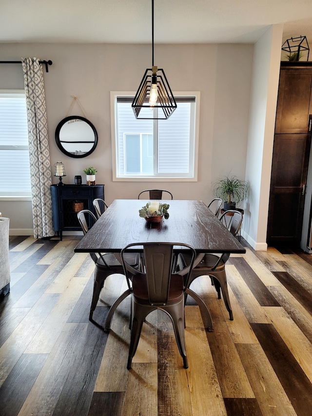 dining area with light hardwood / wood-style flooring