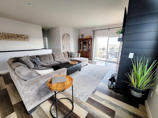 living room with dark hardwood / wood-style flooring