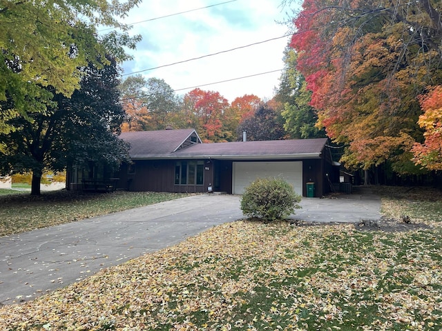 ranch-style home with a garage