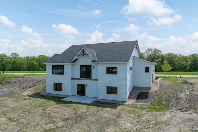 back of property featuring a patio