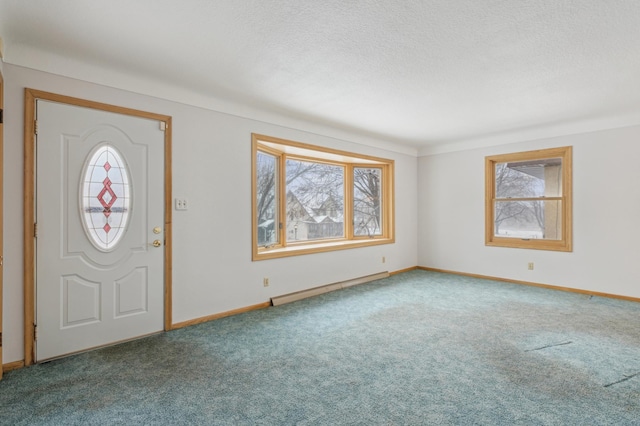 foyer entrance featuring carpet flooring and a baseboard radiator