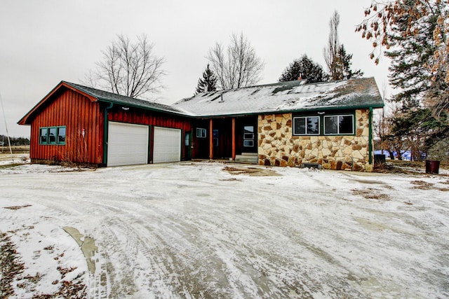 single story home featuring a garage