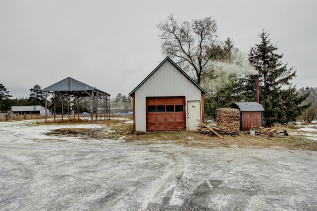 view of snow covered garage