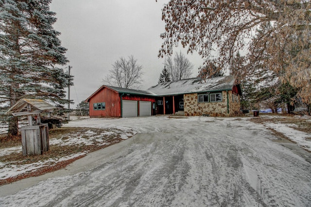 single story home with a garage