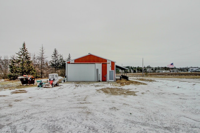 view of snow covered garage