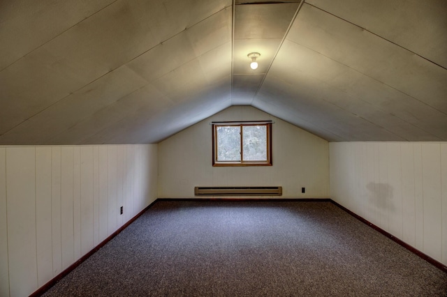 bonus room with lofted ceiling, carpet flooring, and baseboard heating