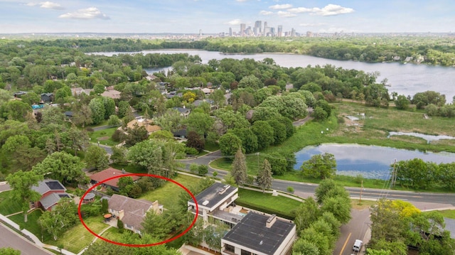 birds eye view of property featuring a water view